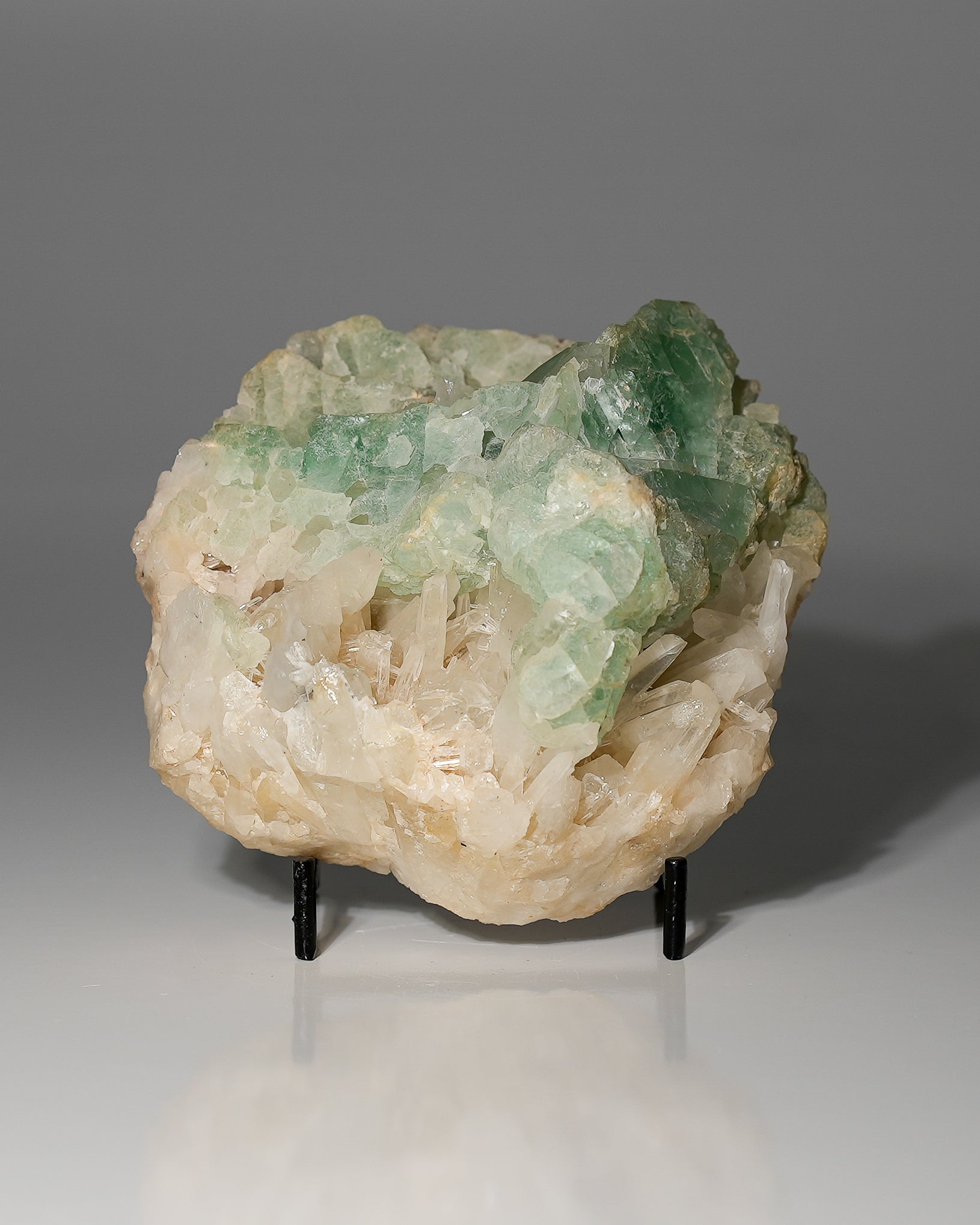 Green Dodecahedral Fluorite on Quartz
