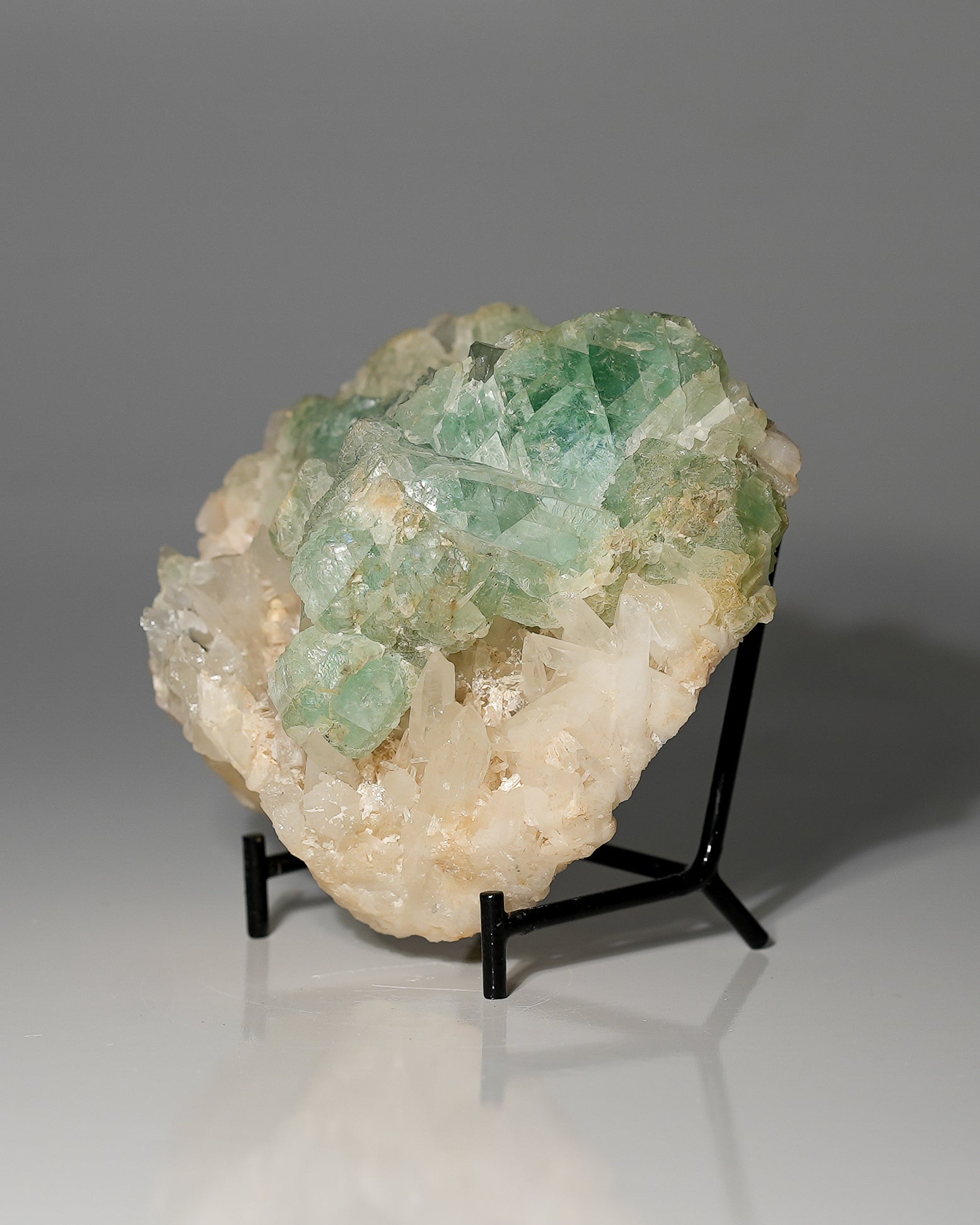 Green Dodecahedral Fluorite on Quartz