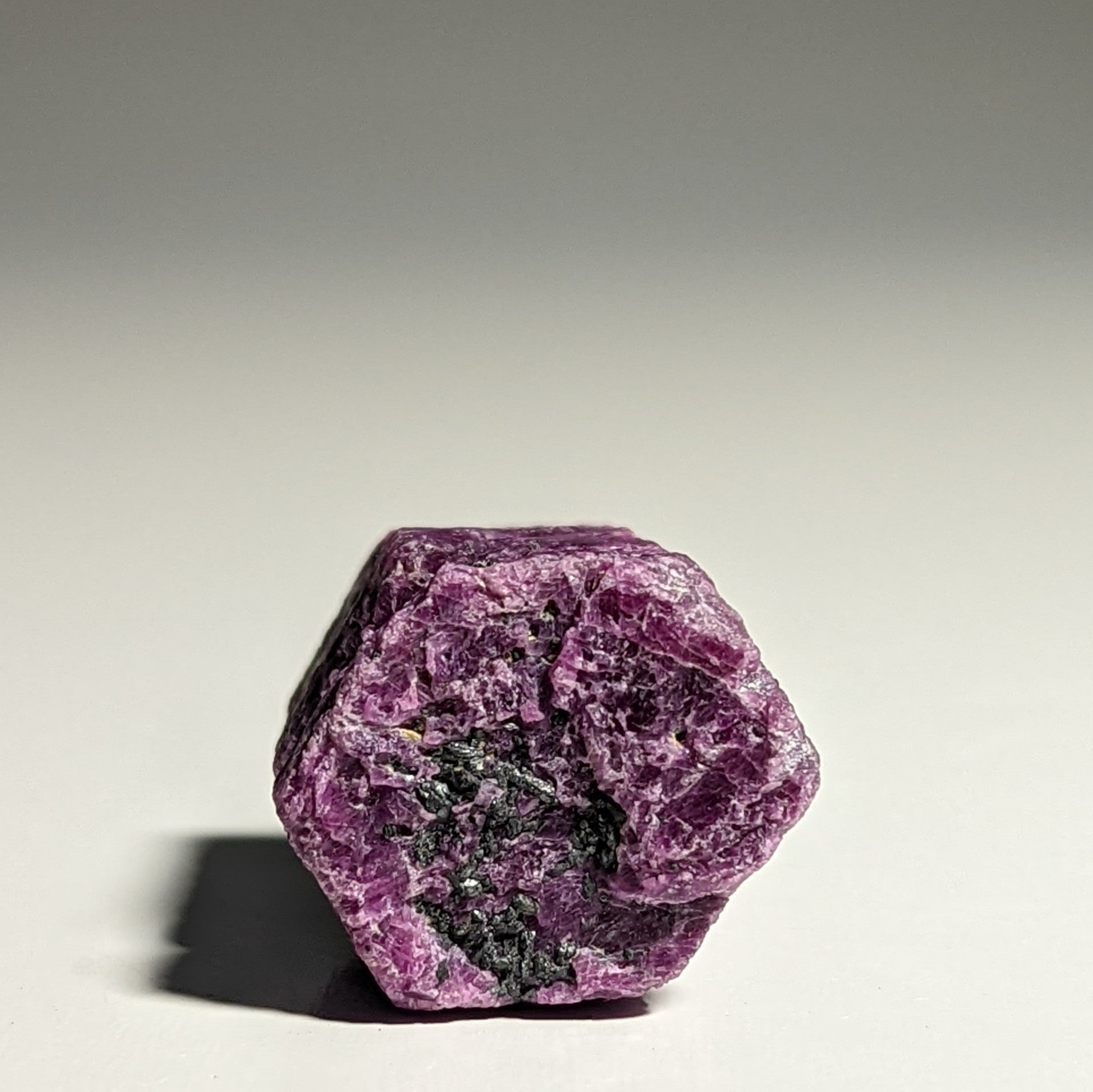 Natural Ruby Corundum with Bright Pink and Red Hues and Stunning Hexagonal Structure
